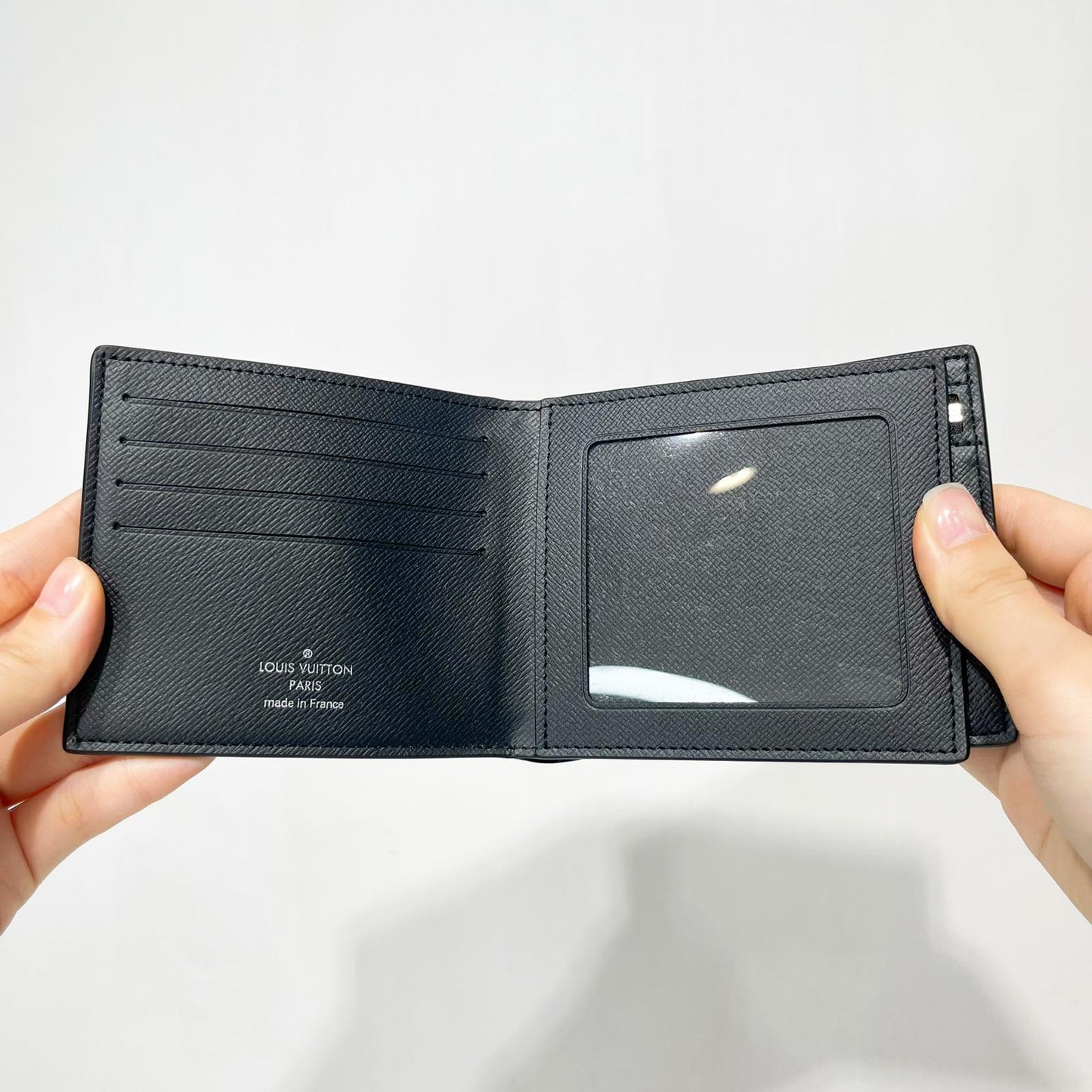 Shop Louis Vuitton TAIGA Amerigo wallet (M62045) by sunnyfunny